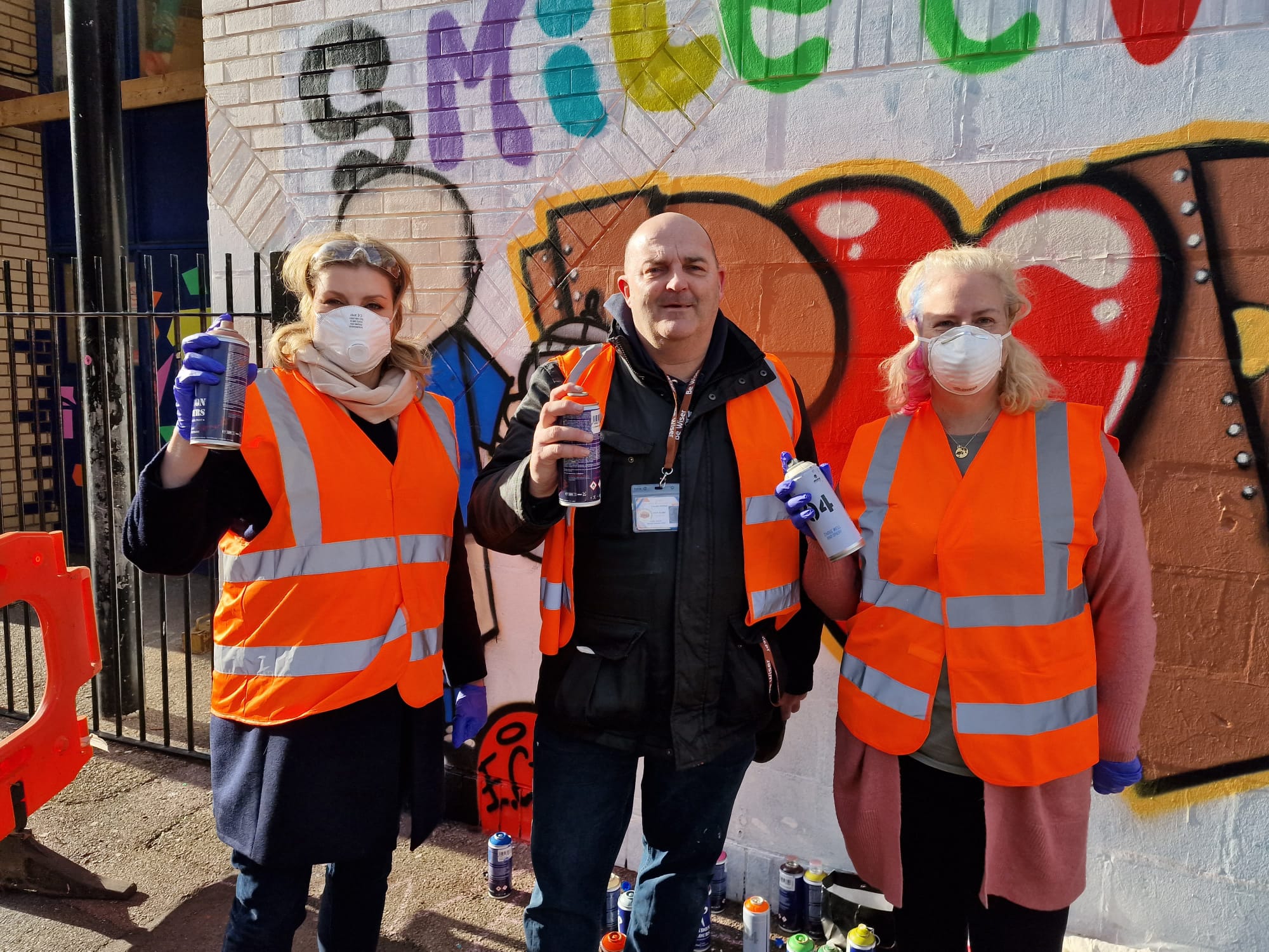 Dame Penny Mordaunt attending a Portsmouth community street art project