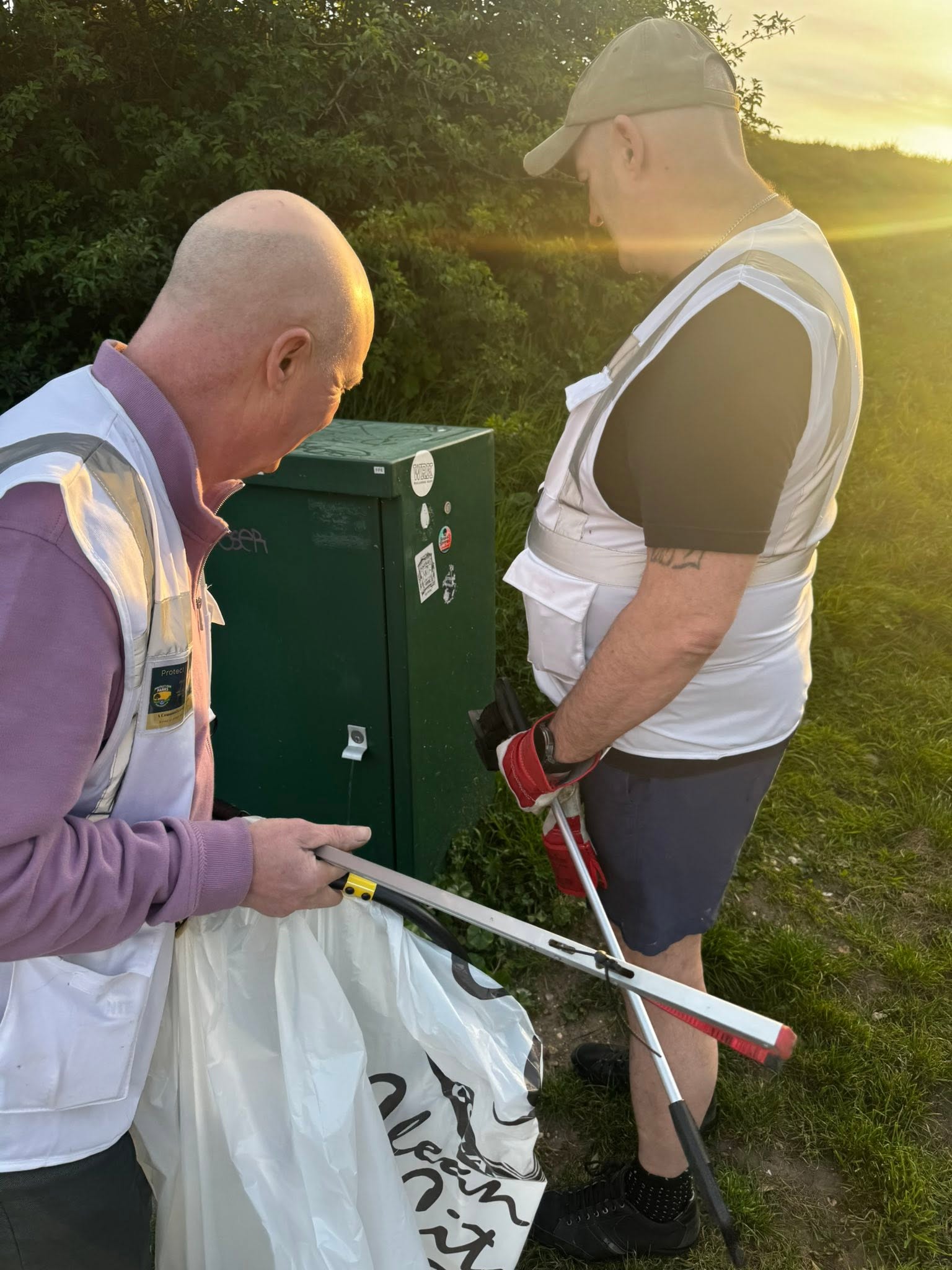 Protect Our Parks volunteers picking litter and checking a green space